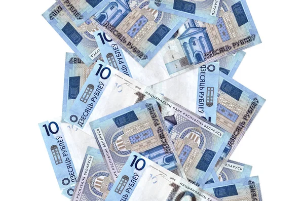 Beyaz üzerine izole edilmiş 10 Belorus rublesi. Birçok banknot sol ve sağ tarafta beyaz kopya alanı ile düşüyor