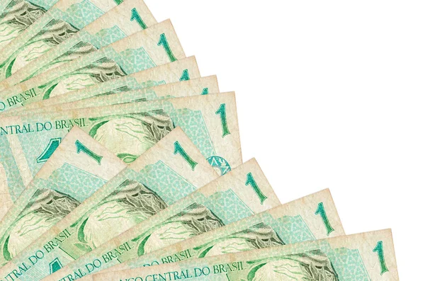 1 Brezilyalı gerçek banknot beyaz arka planda izole edilmiş bir şekilde duruyor. Fan kaplamasında da fotokopi alanı var. Maaş zamanı kavramı veya finansal işlemler