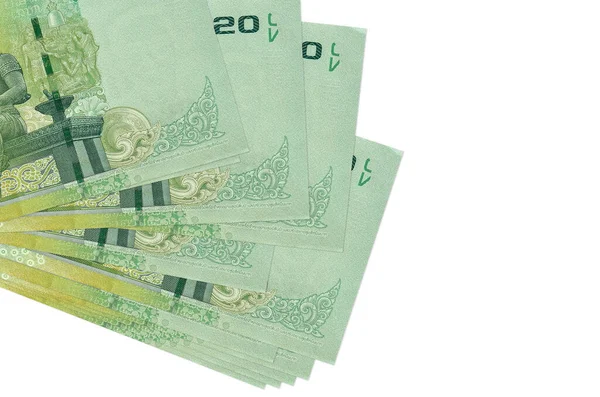 20 Tayland Baht banknotları küçük gruplar halinde ya da beyaz paketler halinde uzanıyor. Kopyalama alanı olan bir model. İş ve para değişimi kavramı