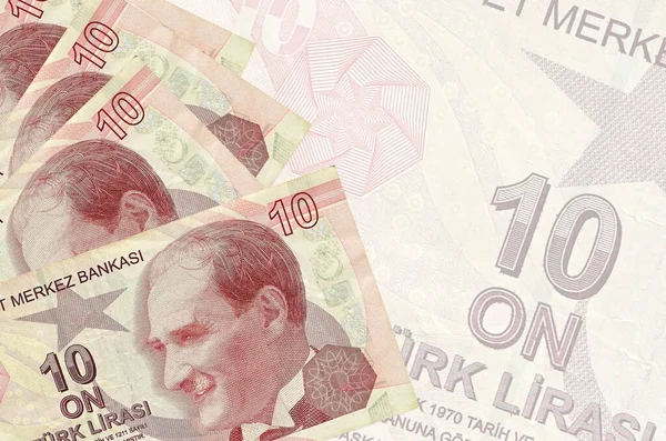 Büyük yarı şeffaf banknotun arka planında 10 Türk lirası duruyor. Kopyalama alanı olan soyut iş arkaplanı