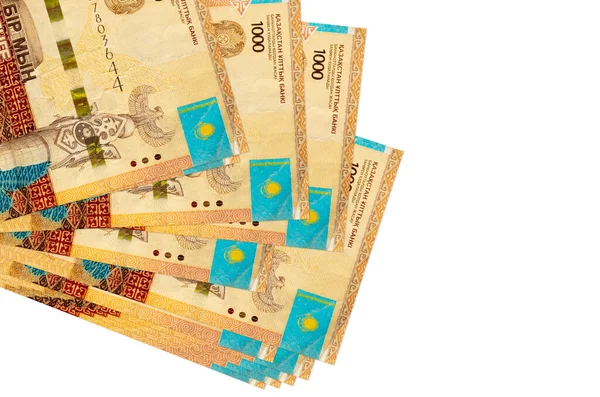 1000张哈萨克斯坦坚韧面额钞票分成小团或包裹在白色上 带复制空间的模型 业务和货币兑换概念 — 图库照片