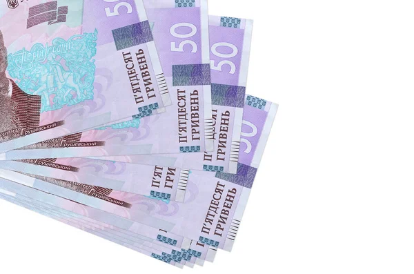 50 Ukrayna hrivniası banknotları küçük gruplar halinde ya da beyazın üzerine izole edilmiş paketler halinde yatar. Kopyalama alanı olan bir model. İş ve para değişimi kavramı