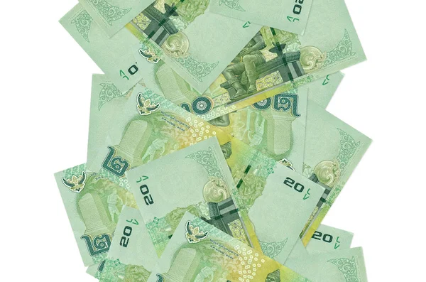 20 Tayland Baht senedi beyazlar üzerinde uçuyor. Birçok banknot sol ve sağ tarafta beyaz kopya alanı ile düşüyor