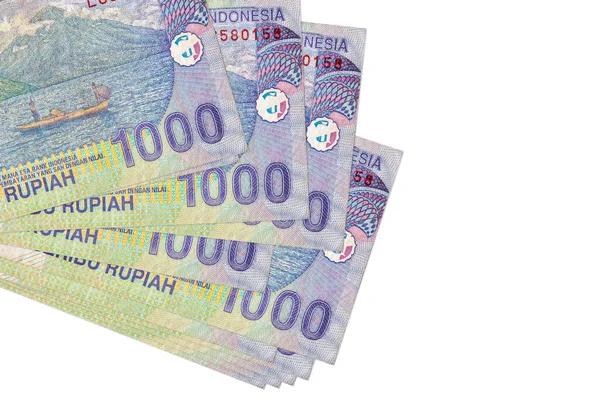 1000 Indonezyjskich Banknotów Rupii Leży Małej Grupie Lub Opakowaniu Odizolowanym — Zdjęcie stockowe