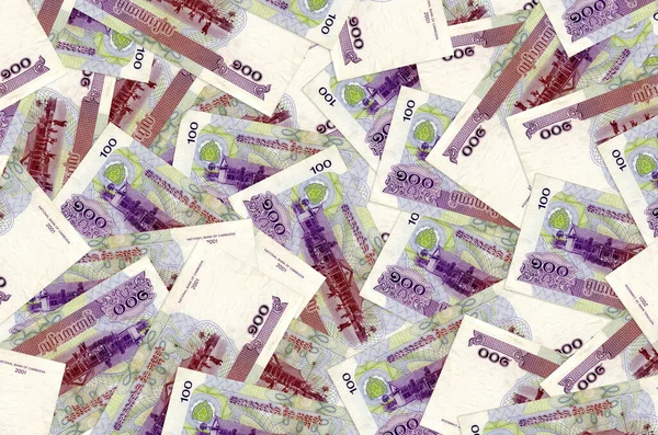 100 Kamboçyalı isyan faturası yığınla. Zengin yaşam kavramsal geçmişi. Büyük miktarda para.