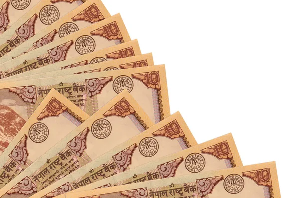 10 Nepal Rupisi banknotları beyaz arka planda izole edilmiş, fotokopi alanı da pervaneye yakın duruyor. Maaş zamanı kavramı veya finansal işlemler