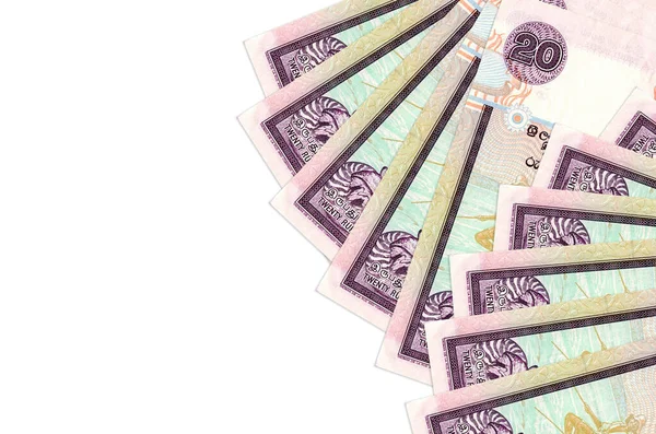 20 Sri Lanka Rupisi banknotları beyaz arka planda fotokopi alanı ile izole bir şekilde duruyor. Zengin yaşam kavramsal geçmişi. Büyük miktarda ulusal para birimi zenginliği