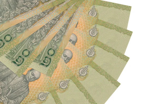 20 Tayland Baht banknotu beyaz arka planda izole edilmiş bir şekilde duruyor ve fotokopi alanı fan şeklinde dizilmiş. Finansal işlemler kavramı