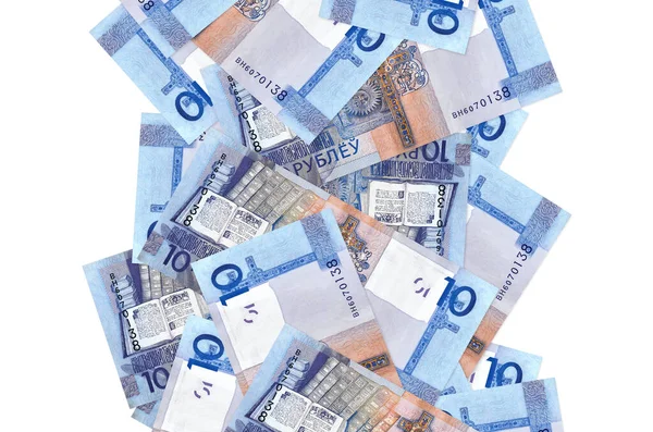 Beyaz üzerine izole edilmiş 10 Belorus rublesi. Birçok banknot sol ve sağ tarafta beyaz kopya alanı ile düşüyor