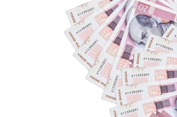 20 Hırvat kuna banknotu beyaz arka planda fotokopi alanı ile izole edilmiş yatıyor. Zengin yaşam kavramsal geçmişi. Büyük miktarda ulusal para birimi zenginliği
