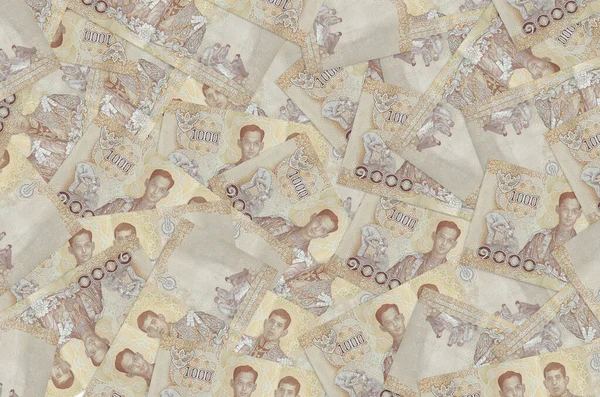 1000 Tayland baht faturası büyük bir yığın halinde duruyor. Zengin yaşam kavramsal geçmişi. Büyük miktarda para.