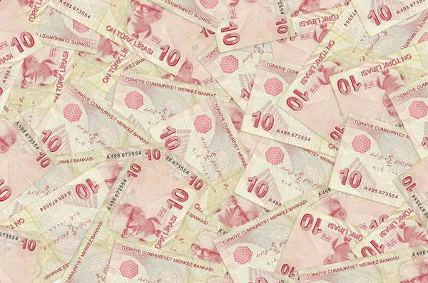 10 Türk lirası büyük bir yığın halinde duruyor. Zengin yaşam kavramsal geçmişi. Büyük miktarda para.