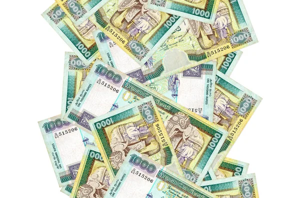 白で孤立して飛んでいる1000スリランカのルピー札 左右に白書スペースのある紙幣が多い — ストック写真
