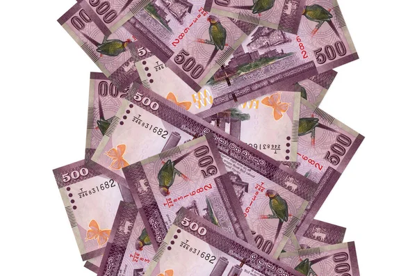 500スリランカは 白で孤立して飛んでいる法案をルピー 左右に白書スペースのある紙幣が多い — ストック写真