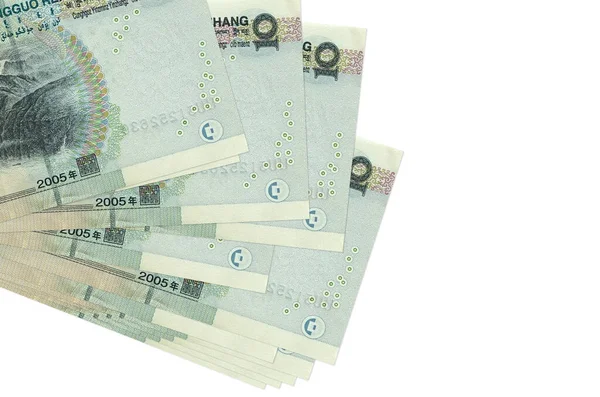10 Çin yuanı banknotları küçük gruplar halinde ya da beyaz paketler halinde uzanıyor. Kopyalama alanı olan bir model. İş ve para değişimi kavramı