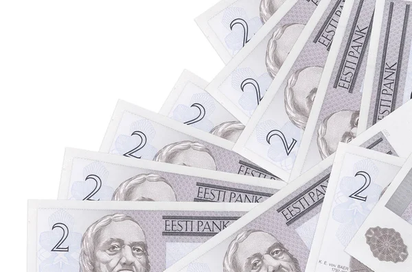 2 Estonya kroon banknotu beyaza izole edilmiş farklı bir sırayla yatar. Yerel bankacılık ya da para kazanma konsepti. İş arkaplanı afişi
