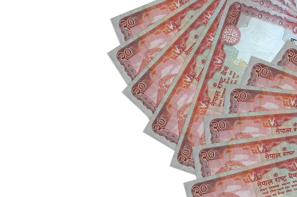 20 Nepal Rupisi banknotları beyaz arka planda, kopyalama alanı ile izole bir şekilde duruyor. Zengin yaşam kavramsal geçmişi. Büyük miktarda ulusal para birimi zenginliği