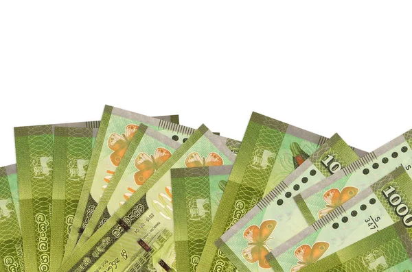 Ekranın alt tarafında 1000 Sri Lanka rupi banknot var. Beyaz arka planda izole edilmiş ve fotokopi alanı var. Paralı iş kavramları için arkaplan afişi şablonu