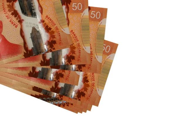 50 Kanada doları küçük gruplar halinde ya da beyaz paketler halinde yatar. Kopyalama alanı olan bir model. İş ve para değişimi kavramı