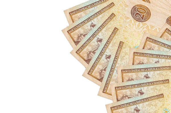 20 Dominikli peso banknot beyaz arka planda fotokopi alanı ile izole bir şekilde duruyor. Zengin yaşam kavramsal geçmişi. Büyük miktarda ulusal para birimi zenginliği