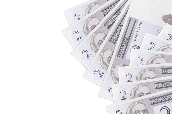 İki Estonya kroon banknotu beyaz arka planda fotokopi alanı ile izole edilmiş olarak yatar. Zengin yaşam kavramsal geçmişi. Büyük miktarda ulusal para birimi zenginliği