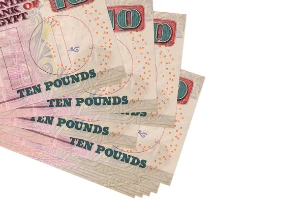 10 Mısır sterlinli banknotlar küçük gruplar halinde ya da beyaz paketler halinde bulunur. Kopyalama alanı olan bir model. İş ve para değişimi kavramı