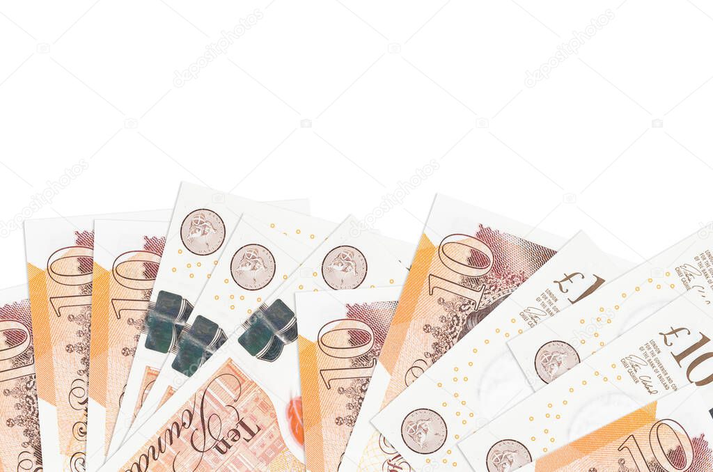 10 British pounds bills lies on bottom side of screen isolated on white background with copy space. Background banner template for business concepts with money