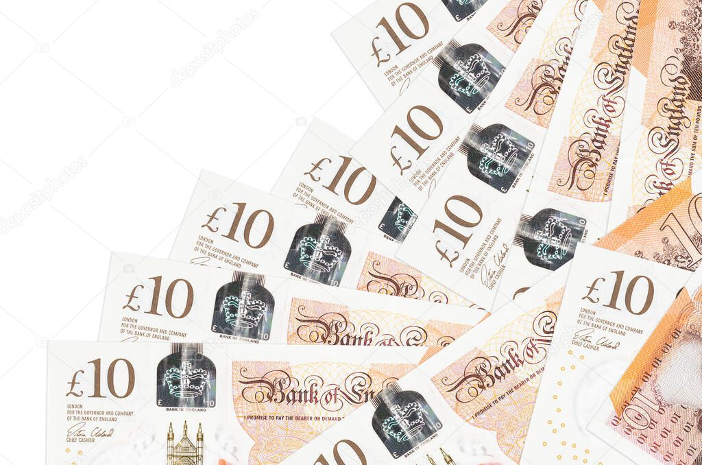 10 British pounds bills lies in different order isolated on white. Local banking or money making concept. Business background banner