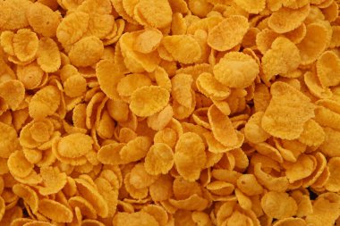 Mısır gevreği arkaplanı yakın plan. Sabah kahvaltısı için mısır gevreği kutusu.