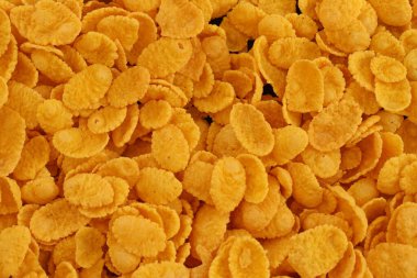 Mısır gevreği arkaplanı yakın plan. Sabah kahvaltısı için mısır gevreği kutusu.