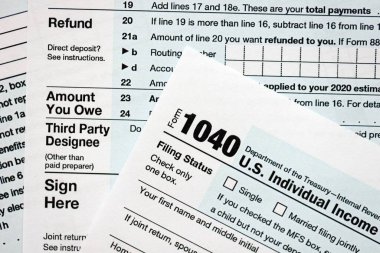 1040 ABD bireysel gelir vergi iade formu yakın çekim. Birleşik Devletler 'in birkaç sayfası vergiden muaf. ABD 'de vergi ödeme ve muhasebe kavramı