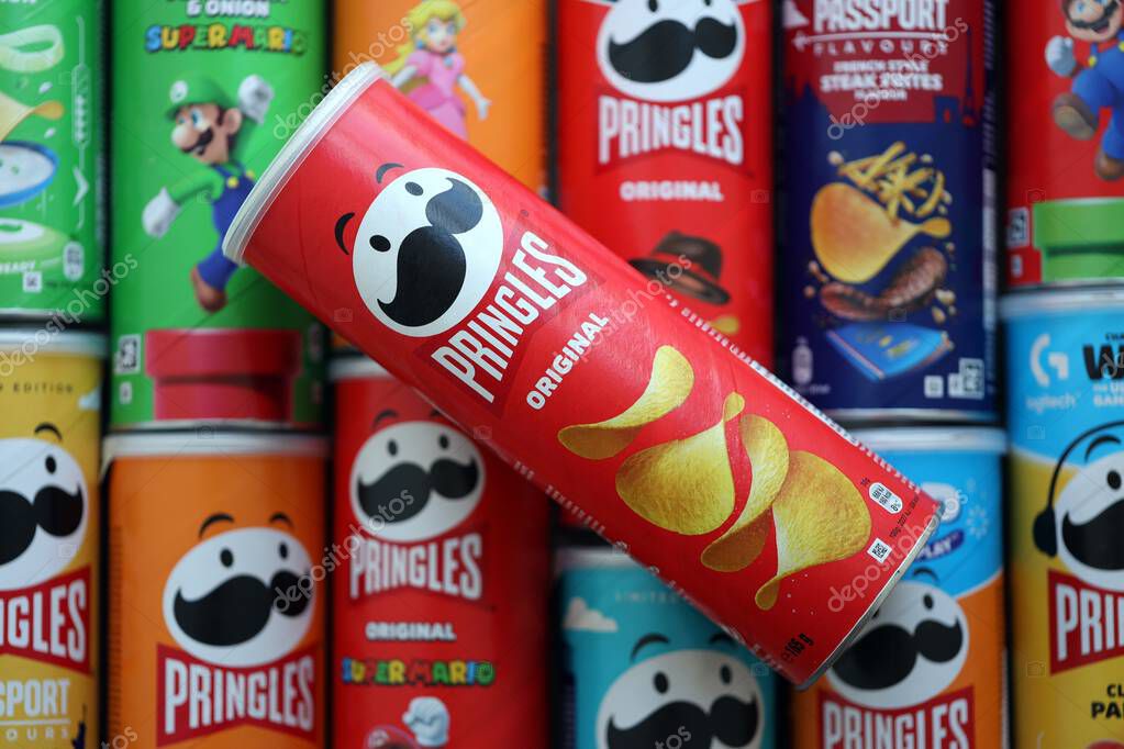 KYIV, UKRAINE - SEPTEMBER 21, 2025 Many pringles tubes of chips with various flavours close up