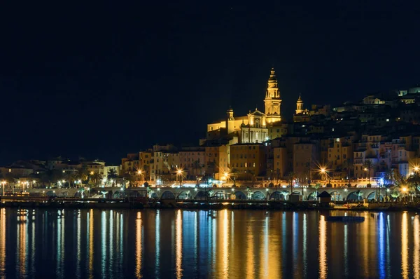 Panoramic lovely view of the Menton old town in full night