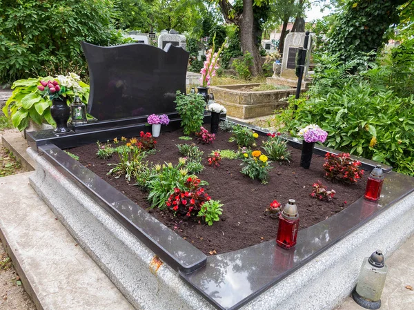 Well groomed cemetery and flowers on it — Stock Photo, Image