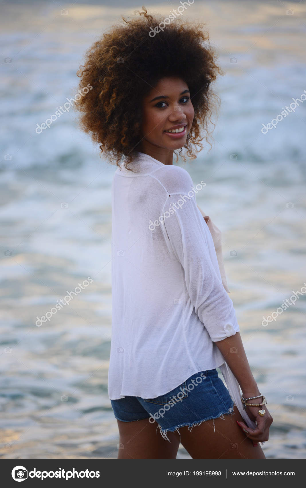 Beautiful Woman Portrait Afro Hair Relax Sunset Sea Stock Photo