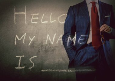 Self Introduction - Hello, My name is ... written on a blackboard with businessman clipart