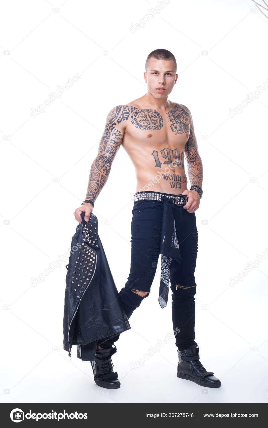 Young Man Black Jeans Belt Rhinestones Handsome Holds His Hand Stock Photo  by ©BLACKFACTORY 207278746