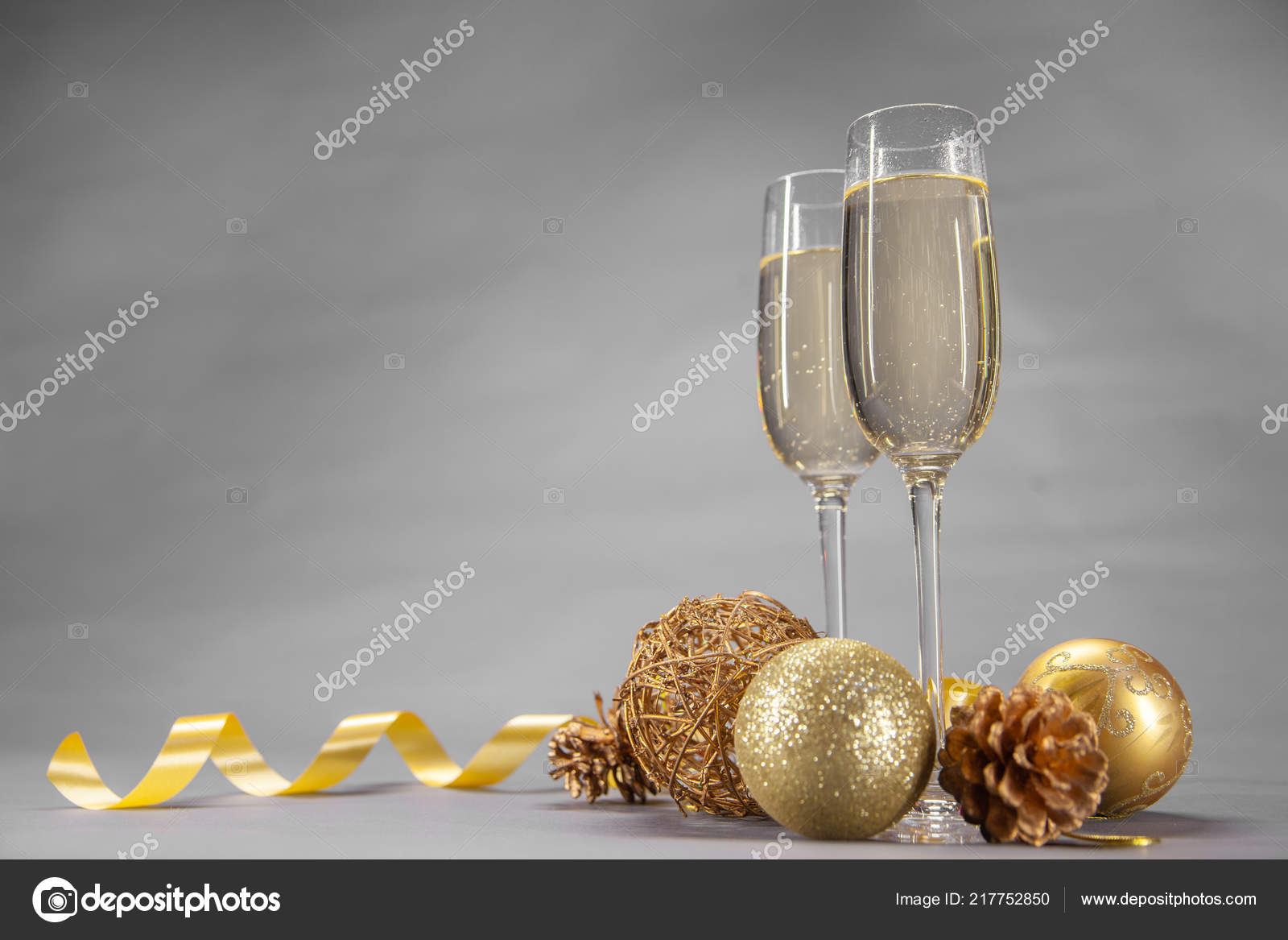 Two Glasses Champagne Decorated Christmas Toys Ribbon Gold Gray
