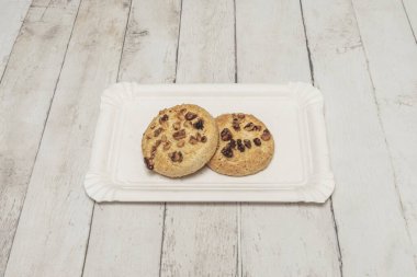 Collection of Turkish tea cakes with portioned baklava, lokum (Turkish delight), and honey-dipped sesame cookies with pistachios