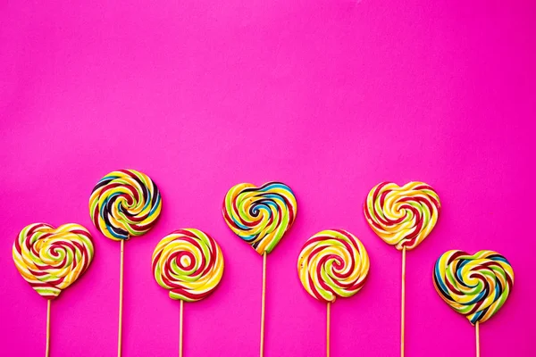 Multicolored Different Sweets Lollipops Pink Background Copy Space Top View — Stock Photo, Image