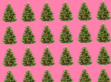 Christmas composition. Pattern made of Christmas tree branches on pastel pink background. Christmas, winter, new year concept. Flat lay, top view, square