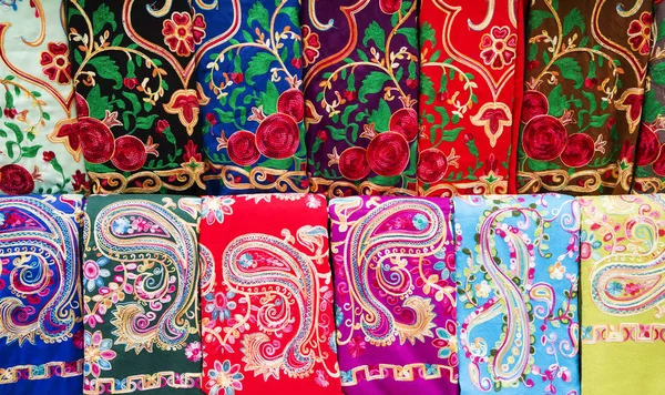 Colorful silk Eastern Turkish shawls on display — Stok fotoğraf