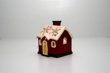 Noel oyuncak ev beyaz zemin yalıtımı hakkında elinde