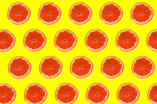 Set Red Grapefruit Slices Yellow Background Healthy Food — Stok fotoğraf