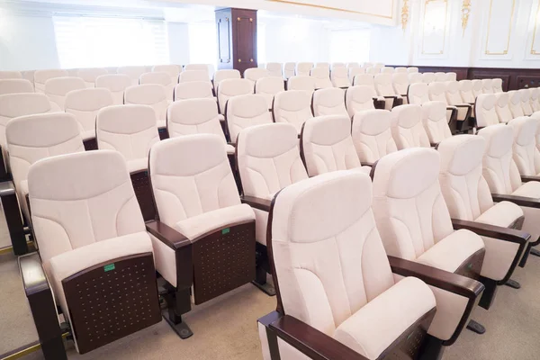 white leather chairs in the auditorium, conference room.