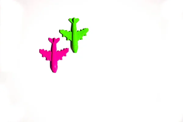 Plastik red and green airplane toy on white background — 스톡 사진