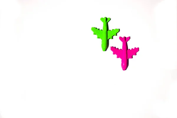 Plastik red and green airplane toy on white background — 스톡 사진