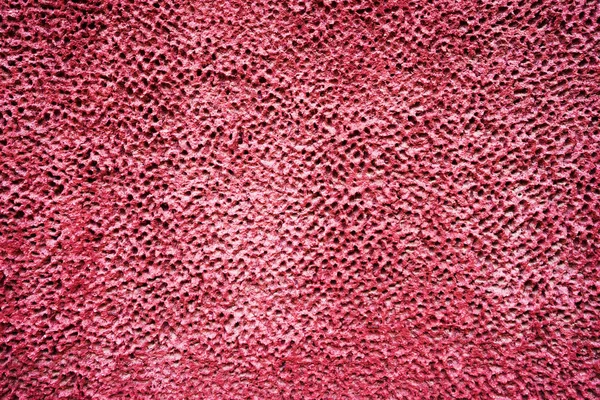 Den rödbruna nedgångna cement vägg konsistens. Mörk rosa stuckatur bakgrund. Abstrakt mönster av grunge röd betongvägg. Vinous målade vägg närbild — Stockfoto