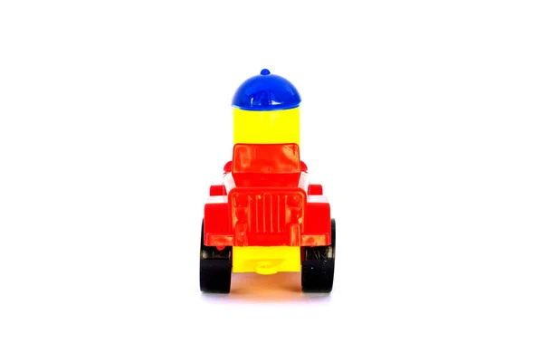 Brinquedo Infantil Carro Plástico Vermelho Com Motorista Fundo Branco — Fotografia de Stock