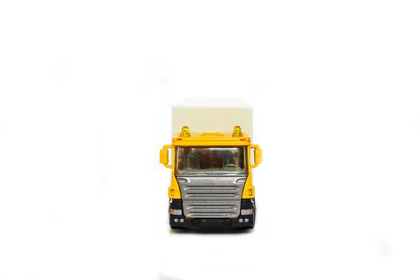 A yellow semi truck with a white trailer attached. Isolated on a white background. Clipping path included — Stock Photo, Image